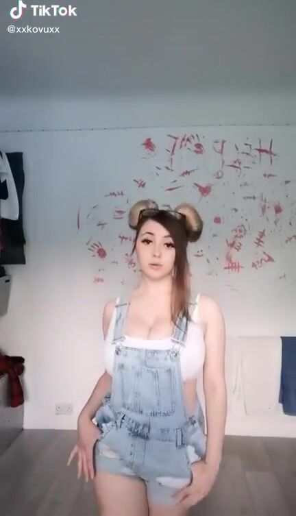 18 year old shows off huge tits in dungarees