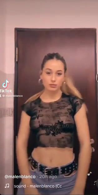 Not sure what the design on her shirt is. Keep staring until you can figure it out.