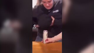 Japanese girl crushes can with her boobs