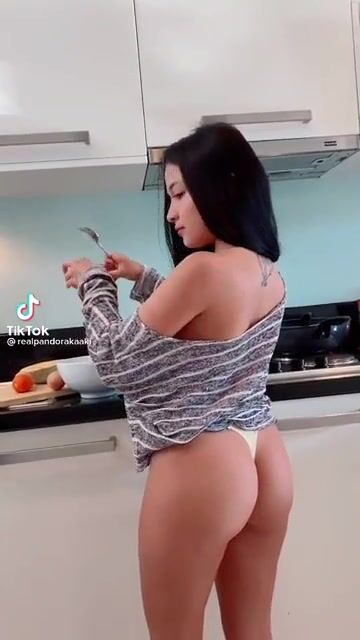 Naked cooking in the kitchen