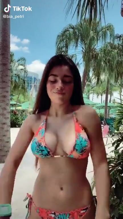 Big and Bouncy in a top that can barely contain them
