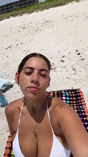 Lyss loves showing off those huge tiddies