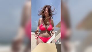 Sexy TikTok Girls: @mady_gio is still on the beach showing off her assets. #4