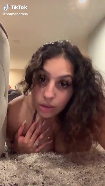 she already has em pulled to the side