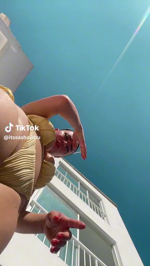 @itssashawbu Camerra sitting bikini