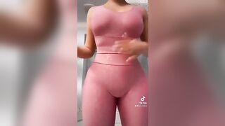 Sexy TikTok Girls: Squeezing her peach into some spandex. #4